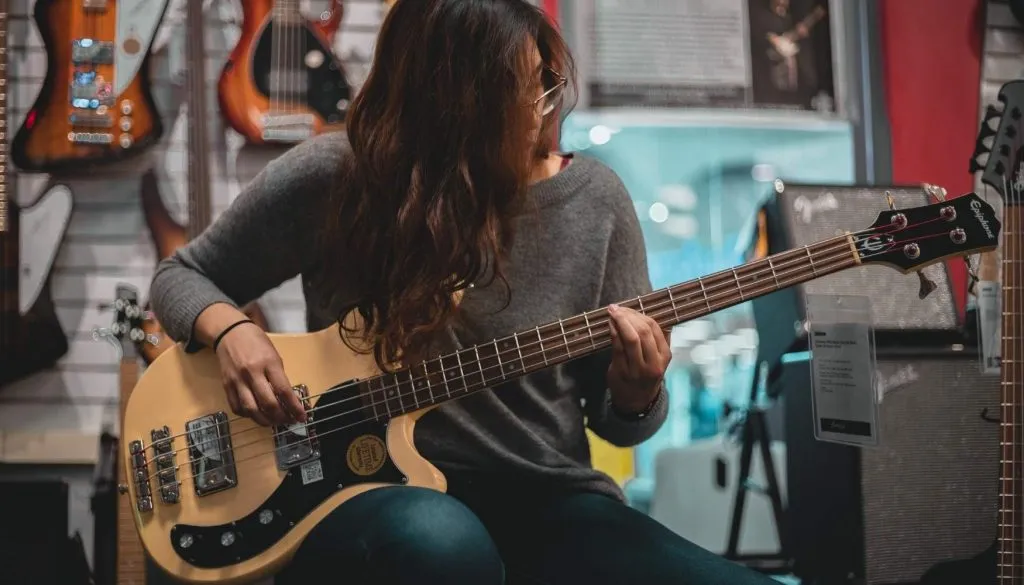 should i learn bass or guitar